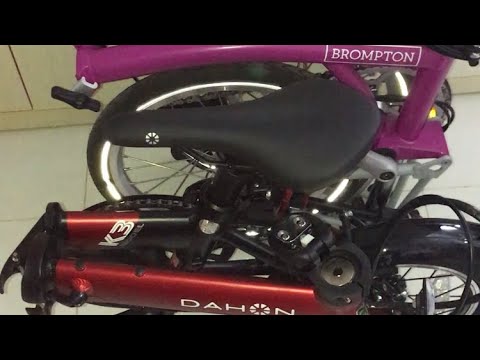Comparing Dahon 19 K3 Red Black Folding Bike with Brompton Berry Crush/Grey M2L